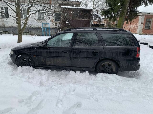 Черный Опель Астра, объемом двигателя 1.8 л и пробегом 1 тыс. км за 500 $, фото 1 на Automoto.ua