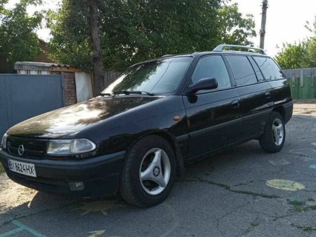 Черный Опель Астра, объемом двигателя 1.6 л и пробегом 332 тыс. км за 2300 $, фото 1 на Automoto.ua