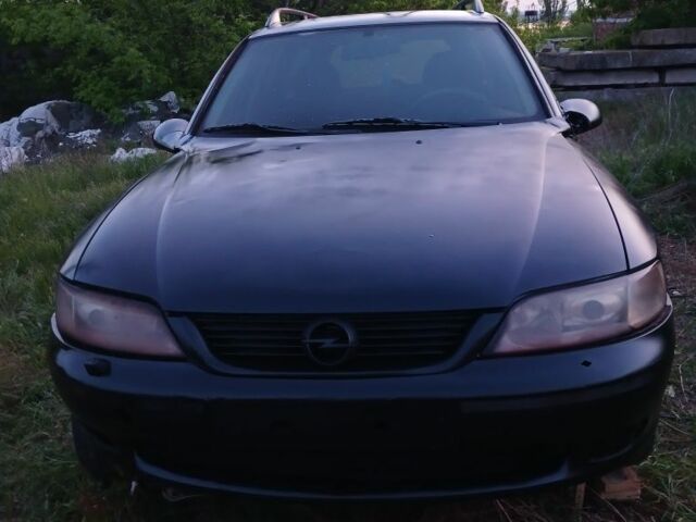 Черный Опель Астра, объемом двигателя 2 л и пробегом 200 тыс. км за 237 $, фото 1 на Automoto.ua