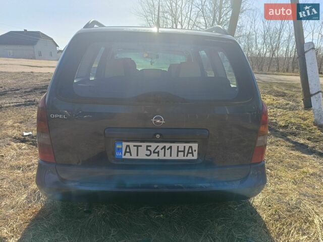 Черный Опель Астра, объемом двигателя 2 л и пробегом 423 тыс. км за 2600 $, фото 1 на Automoto.ua