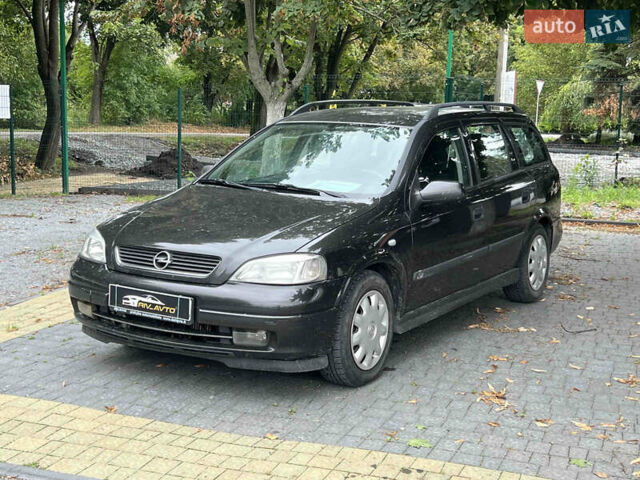 Черный Опель Астра, объемом двигателя 1.7 л и пробегом 350 тыс. км за 2350 $, фото 1 на Automoto.ua