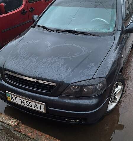 Черный Опель Астра, объемом двигателя 1.6 л и пробегом 348 тыс. км за 3800 $, фото 1 на Automoto.ua