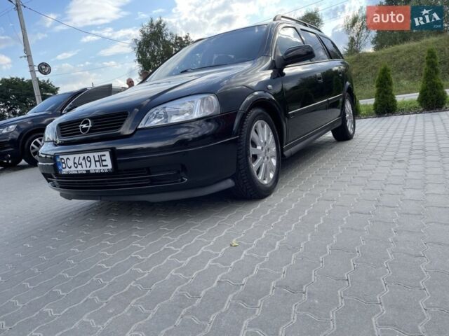 Черный Опель Астра, объемом двигателя 2 л и пробегом 335 тыс. км за 3500 $, фото 1 на Automoto.ua