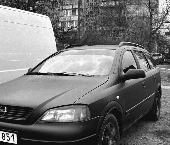 Черный Опель Астра, объемом двигателя 2 л и пробегом 233 тыс. км за 1750 $, фото 1 на Automoto.ua