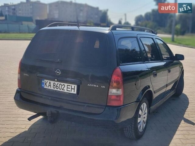 Черный Опель Астра, объемом двигателя 1.6 л и пробегом 290 тыс. км за 3200 $, фото 1 на Automoto.ua