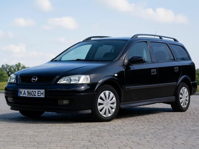 Черный Опель Астра, объемом двигателя 1.6 л и пробегом 292 тыс. км за 3500 $, фото 1 на Automoto.ua