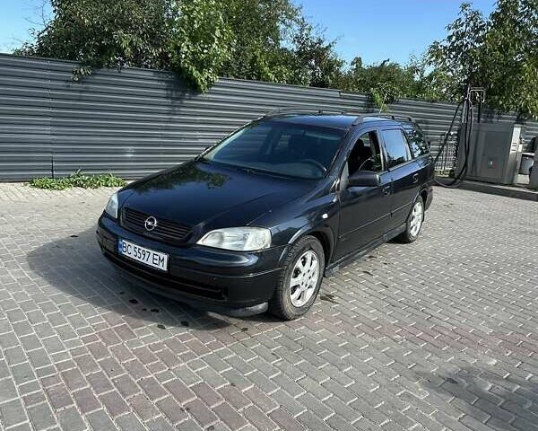 Черный Опель Астра, объемом двигателя 1.8 л и пробегом 350 тыс. км за 2400 $, фото 1 на Automoto.ua