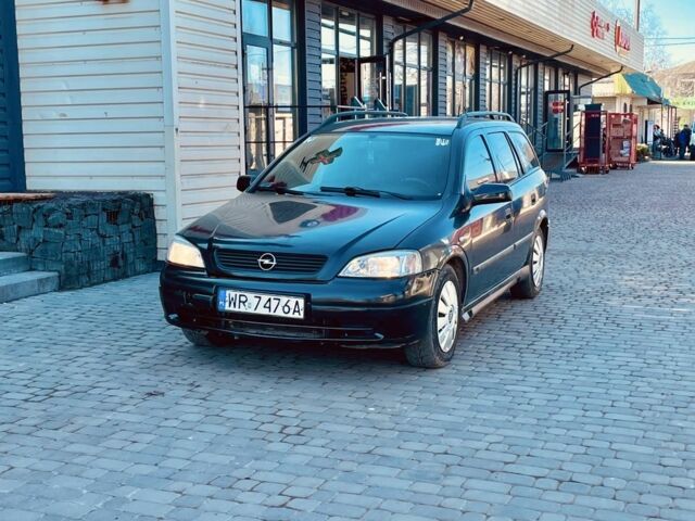 Черный Опель Астра, объемом двигателя 2 л и пробегом 400 тыс. км за 1250 $, фото 1 на Automoto.ua