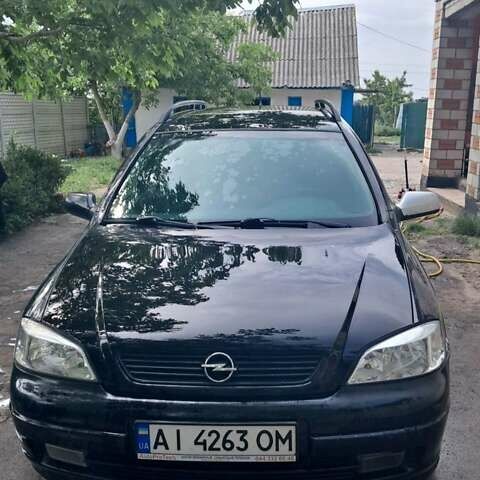 Чорний Опель Астра, об'ємом двигуна 2 л та пробігом 427 тис. км за 3600 $, фото 1 на Automoto.ua