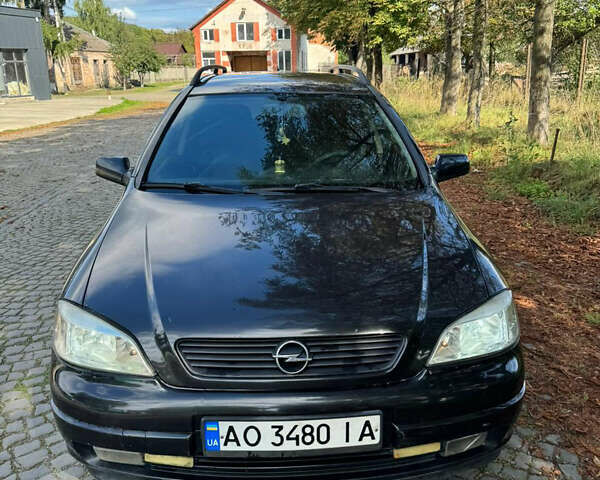 Черный Опель Астра, объемом двигателя 2 л и пробегом 327 тыс. км за 2750 $, фото 1 на Automoto.ua