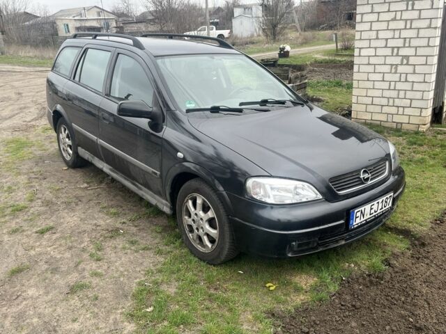 Черный Опель Астра, объемом двигателя 1.8 л и пробегом 180 тыс. км за 1459 $, фото 1 на Automoto.ua