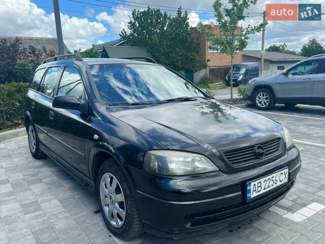 Черный Опель Астра, объемом двигателя 1.6 л и пробегом 385 тыс. км за 2550 $, фото 1 на Automoto.ua