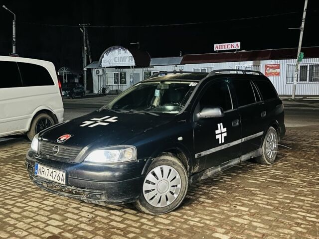 Черный Опель Астра, объемом двигателя 2 л и пробегом 245 тыс. км за 1150 $, фото 1 на Automoto.ua