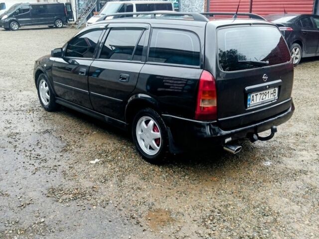 Черный Опель Астра, объемом двигателя 1.6 л и пробегом 350 тыс. км за 2650 $, фото 1 на Automoto.ua