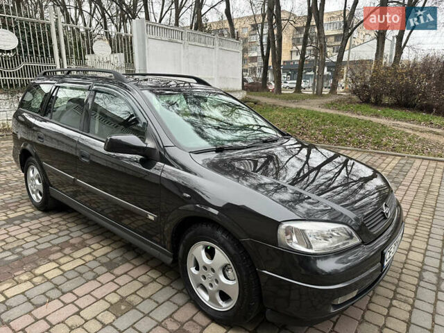 Черный Опель Астра, объемом двигателя 2 л и пробегом 337 тыс. км за 3850 $, фото 1 на Automoto.ua