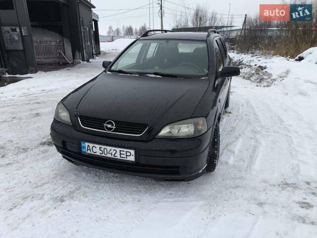 Черный Опель Астра, объемом двигателя 2.2 л и пробегом 350 тыс. км за 2800 $, фото 1 на Automoto.ua