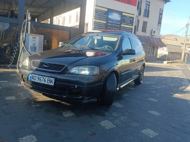 Черный Опель Астра, объемом двигателя 5 л и пробегом 330 тыс. км за 1420 $, фото 1 на Automoto.ua