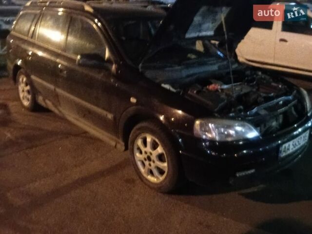 Черный Опель Астра, объемом двигателя 2.2 л и пробегом 347 тыс. км за 1500 $, фото 1 на Automoto.ua