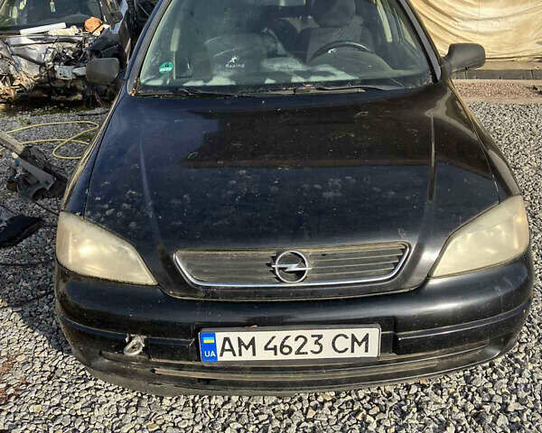 Черный Опель Астра, объемом двигателя 2.2 л и пробегом 300 тыс. км за 1800 $, фото 1 на Automoto.ua