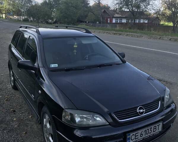 Черный Опель Астра, объемом двигателя 2 л и пробегом 320 тыс. км за 4100 $, фото 1 на Automoto.ua