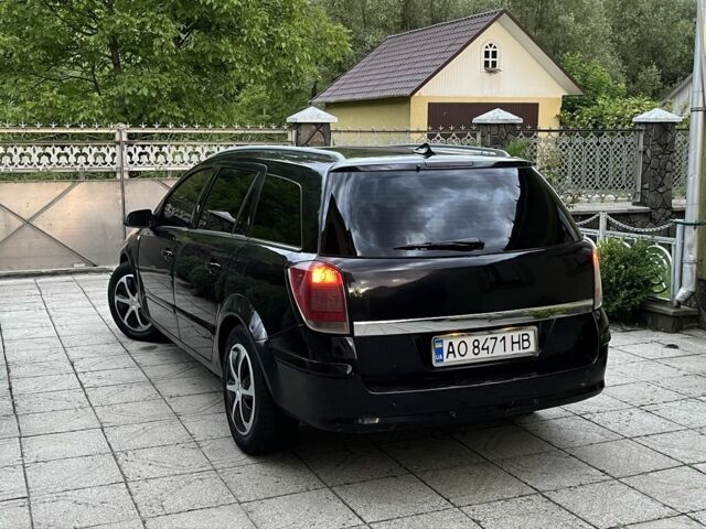 Черный Опель Астра, объемом двигателя 1.7 л и пробегом 330 тыс. км за 3400 $, фото 1 на Automoto.ua