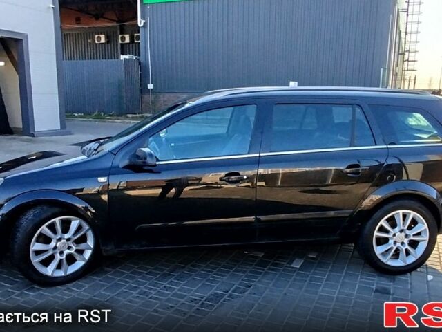 Черный Опель Астра, объемом двигателя 1.9 л и пробегом 355 тыс. км за 3900 $, фото 1 на Automoto.ua