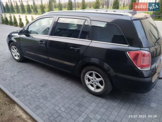 Черный Опель Астра, объемом двигателя 1.8 л и пробегом 218 тыс. км за 3500 $, фото 1 на Automoto.ua