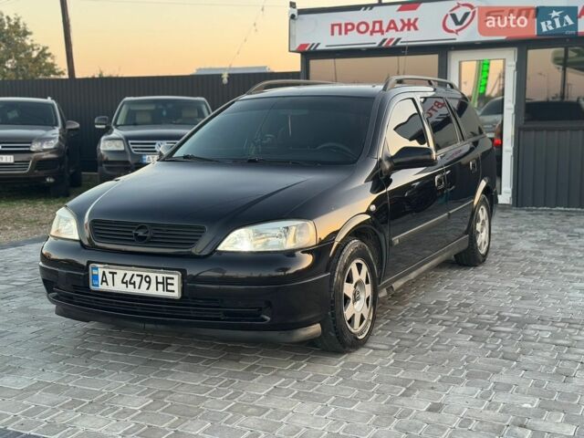 Черный Опель Астра, объемом двигателя 1.6 л и пробегом 290 тыс. км за 3300 $, фото 1 на Automoto.ua