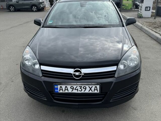 Черный Опель Астра, объемом двигателя 1.8 л и пробегом 255 тыс. км за 4700 $, фото 1 на Automoto.ua