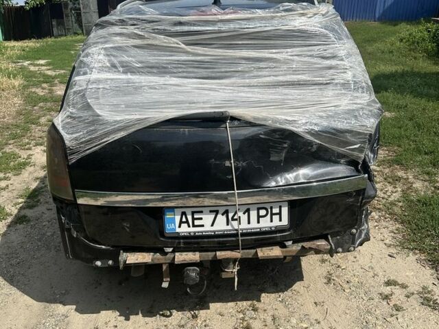 Черный Опель Астра, объемом двигателя 1.9 л и пробегом 352 тыс. км за 2500 $, фото 1 на Automoto.ua