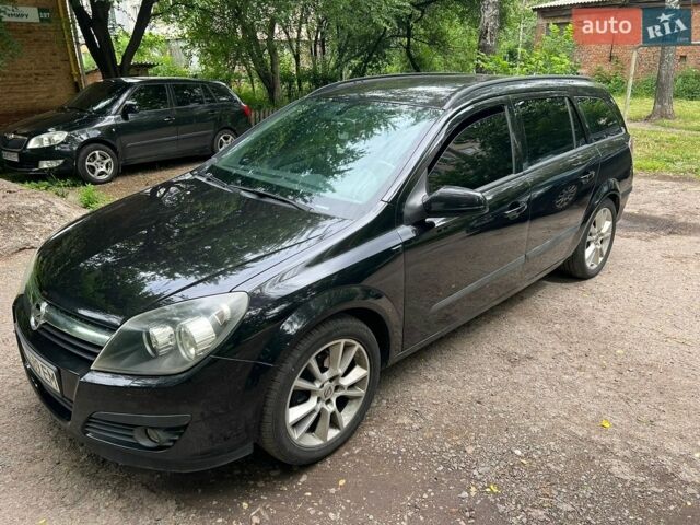 Черный Опель Астра, объемом двигателя 1.8 л и пробегом 249 тыс. км за 3900 $, фото 1 на Automoto.ua