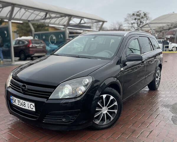 Черный Опель Астра, объемом двигателя 1.9 л и пробегом 220 тыс. км за 3750 $, фото 1 на Automoto.ua
