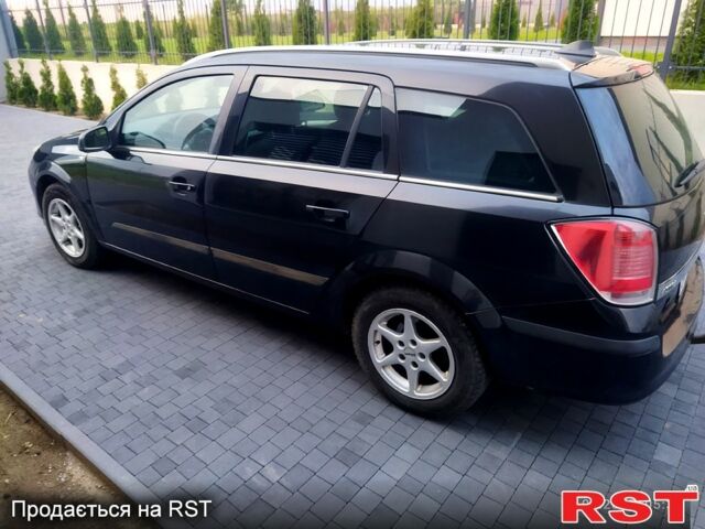 Черный Опель Астра, объемом двигателя 1.8 л и пробегом 218 тыс. км за 3500 $, фото 1 на Automoto.ua