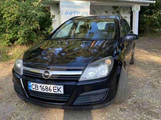 Черный Опель Астра, объемом двигателя 1.6 л и пробегом 234 тыс. км за 5600 $, фото 1 на Automoto.ua
