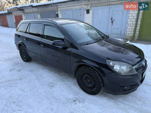 Чорний Опель Астра, об'ємом двигуна 1.6 л та пробігом 442 тис. км за 3299 $, фото 1 на Automoto.ua
