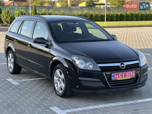 Черный Опель Астра, объемом двигателя 1.6 л и пробегом 235 тыс. км за 5800 $, фото 1 на Automoto.ua