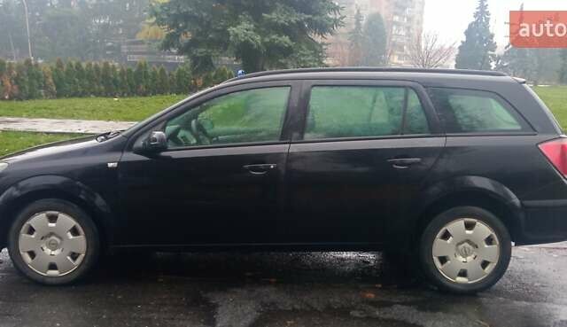 Черный Опель Астра, объемом двигателя 1.69 л и пробегом 387 тыс. км за 3500 $, фото 1 на Automoto.ua