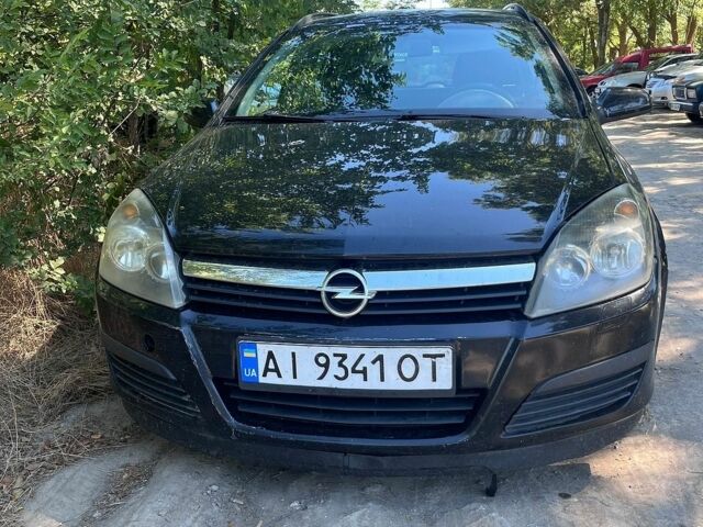 Черный Опель Астра, объемом двигателя 1.6 л и пробегом 272 тыс. км за 4200 $, фото 1 на Automoto.ua