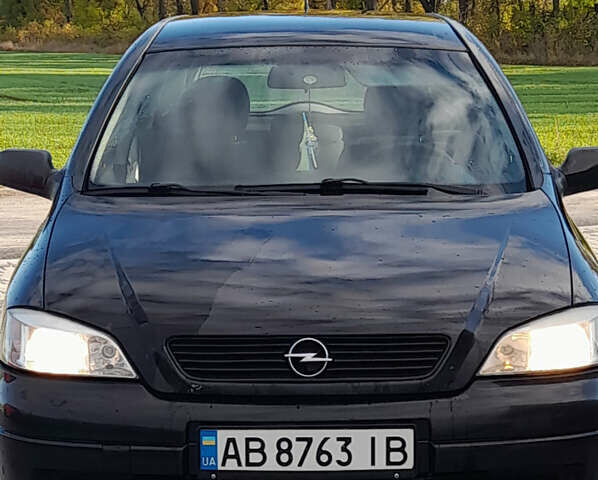 Черный Опель Астра, объемом двигателя 1.6 л и пробегом 340 тыс. км за 3600 $, фото 1 на Automoto.ua