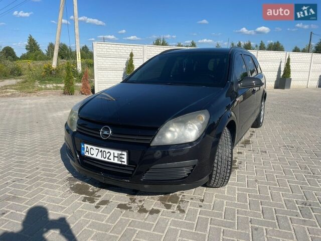 Черный Опель Астра, объемом двигателя 1.6 л и пробегом 285 тыс. км за 4500 $, фото 1 на Automoto.ua
