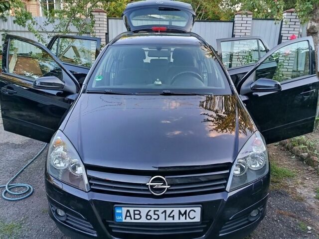 Черный Опель Астра, объемом двигателя 1.6 л и пробегом 235 тыс. км за 5300 $, фото 1 на Automoto.ua