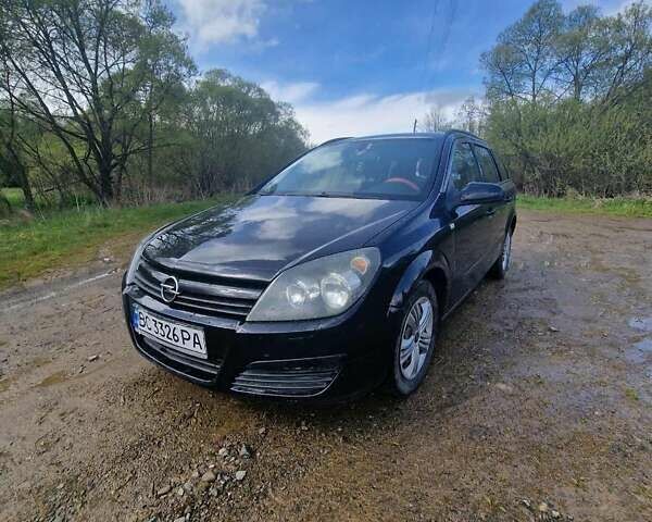 Черный Опель Астра, объемом двигателя 1.69 л и пробегом 252 тыс. км за 3700 $, фото 1 на Automoto.ua