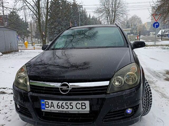 Черный Опель Астра, объемом двигателя 1.7 л и пробегом 350 тыс. км за 5000 $, фото 1 на Automoto.ua