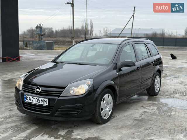 Черный Опель Астра, объемом двигателя 1.8 л и пробегом 185 тыс. км за 4850 $, фото 1 на Automoto.ua