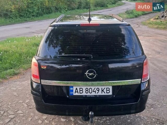 Черный Опель Астра, объемом двигателя 1.6 л и пробегом 224 тыс. км за 4600 $, фото 1 на Automoto.ua