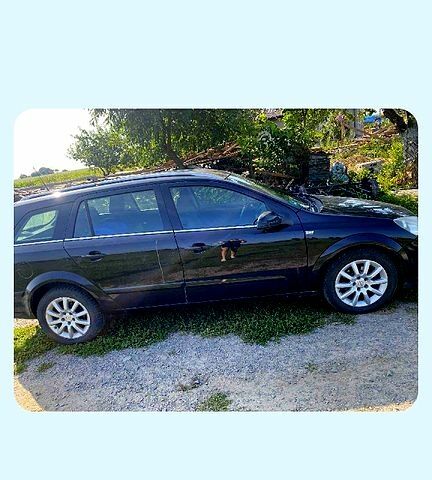 Черный Опель Астра, объемом двигателя 1.6 л и пробегом 250 тыс. км за 3300 $, фото 1 на Automoto.ua
