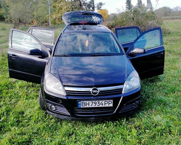 Черный Опель Астра, объемом двигателя 1.7 л и пробегом 212 тыс. км за 4700 $, фото 1 на Automoto.ua