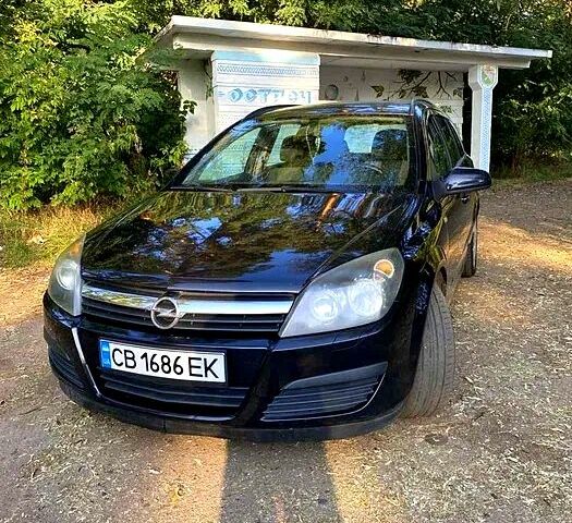 Черный Опель Астра, объемом двигателя 1.6 л и пробегом 234 тыс. км за 5400 $, фото 1 на Automoto.ua