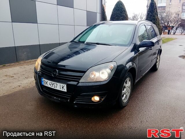 Черный Опель Астра, объемом двигателя 1.7 л и пробегом 320 тыс. км за 3250 $, фото 1 на Automoto.ua
