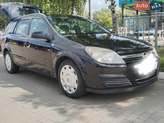 Черный Опель Астра, объемом двигателя 1.6 л и пробегом 282 тыс. км за 5327 $, фото 1 на Automoto.ua